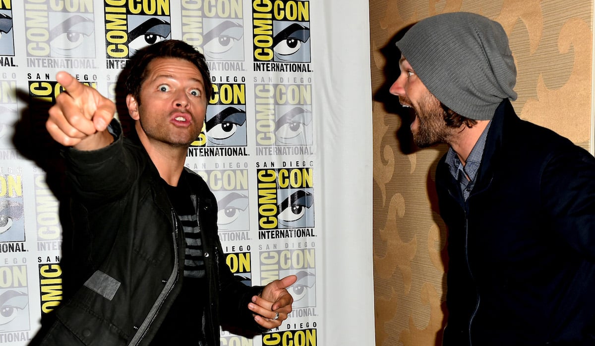 SAN DIEGO, CA - JULY 22:  Misha Collins (L) and Jared Padalecki attend the "Supernatural" press line during Comic-Con International 2018 at Hilton Bayfront on July 22, 2018 in San Diego, California.  (Photo by Jerod Harris/Getty Images)