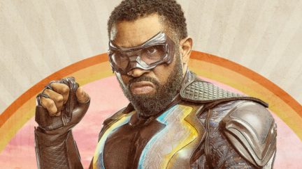 Black Lightning -- Image BLK2_8x12_300dpi.jpg -- Pictured (L-R): Nafessa Williams as Thunder, Cress Williams as Black Lightning, Marvin 