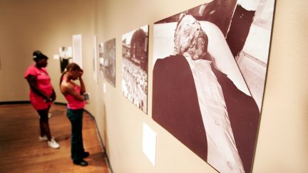 CHICAGO - JUNE 13: A photograph of Emmett Till in his casket hangs on the wall at the Chicago Historical Society June 13, 2005 in Chicago, Illinois. The 