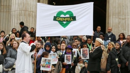 People gather on the steps after the Grenfell Tower National Memorial Service at St Paul's Cathedral in London, to mark the six month anniversary of the Grenfell Tower fire. PRESS ASSOCIATION Photo. Picture date: Thursday December 14, 2017. See PA story MEMORIAL Grenfell. Photo credit should read: Gareth Fuller/PA Wire