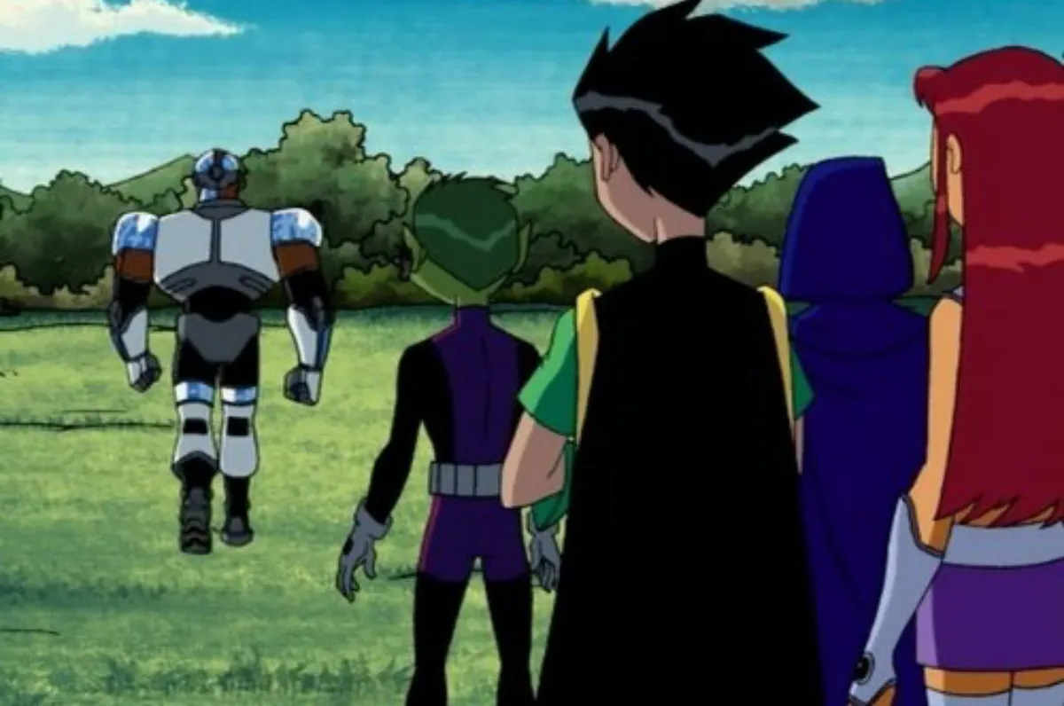 Teen Titans watch cyborg walk away.