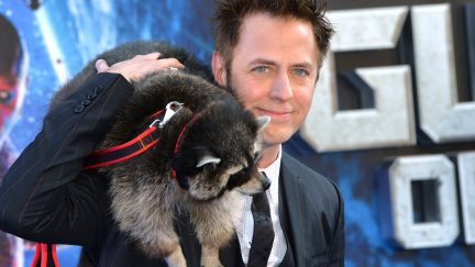 James Gunn with a raccoon on his shoulder at the Guardians of the Galaxy premiere