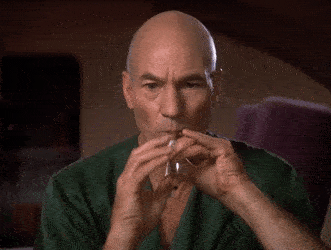 Jean-Luc Picard playing the flute