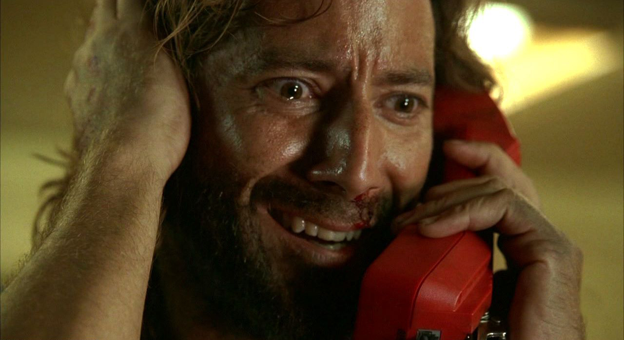 Desmond Hume (Henry Ian Cusack) calls home in LOST episode The Constant
