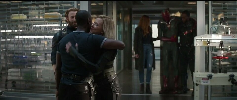 black widow and War Machine hug
