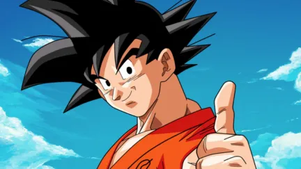 Goku poses with a thumbs up in 