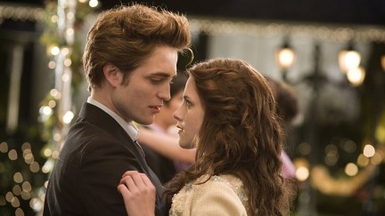 Edward Cullen and Bella Swan dance at prom outside under twinkle lights in 