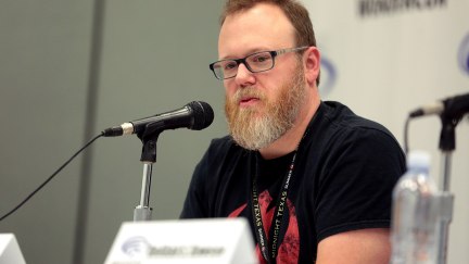 Chuck Wendig speaks at a convention about his work