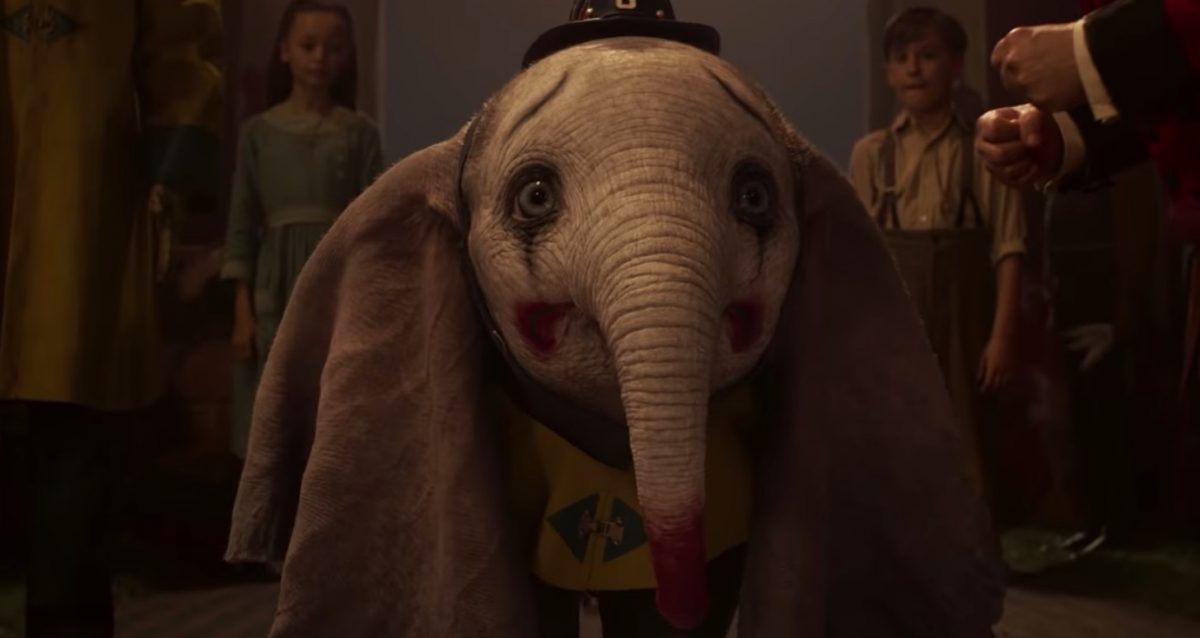 Dumbo's face painted like a clown in Tim Burton's Dumbo.