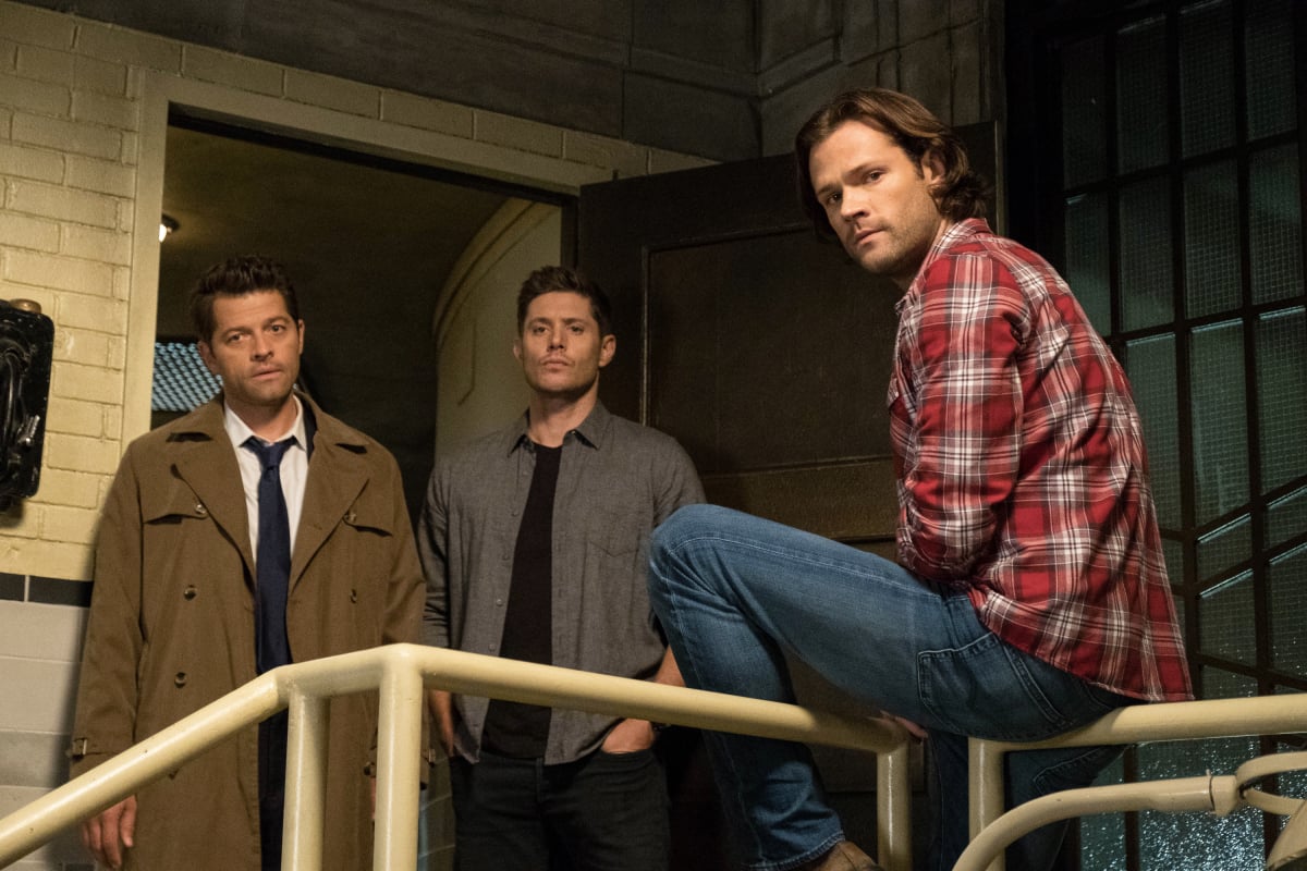 Supernatural -- "Unhuman Nature" -- Image Number: SN1407c_0257b.jpg -- Pictured (L-R): Misha Collins as Castiel, Jensen Ackles as Dean and Jared Padalecki as Sam -- Photo: Cate Cameron/The CW -- ÃÂ© 2018 The CW Network, LLC All Rights Reserved