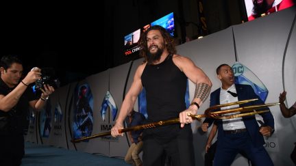 HOLLYWOOD, CALIFORNIA - DECEMBER 12: Jason Momoa attends the premiere of Warner Bros. Pictures' 