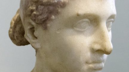 Photograph of an ancient Roman marble sculpture of Cleopatra VII's head as displayed at the Altes Museum in Berlin