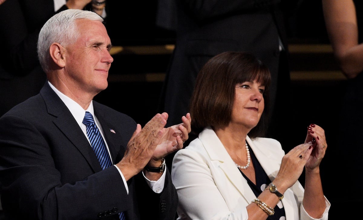 Republican vice presidential candidate Mike Pence stands with his wife Karen Pence on the fourth day of the Republican National Convention on July 21, 2016 at the Quicken Loans Arena in Cleveland, Ohio. Republican presidential candidate Donald Trump received the number of votes needed to secure the party's nomination. An estimated 50,000 people are expected in Cleveland, including hundreds of protesters and members of the media. The four-day Republican National Convention kicked off on July 18. 