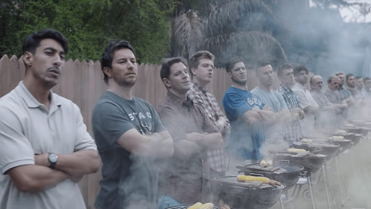long line of men barbequing in gillete ad about toxic masculinity