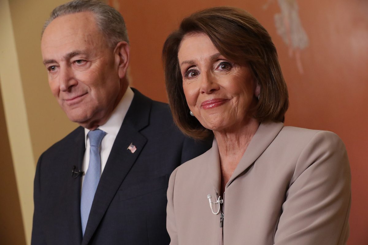 WASHINGTON, DC - JANUARY 08: Speaker of the House Nancy Pelosi (D-CA) and Senate Minority Leader Charles Schumer (D-NY) pose for photographs after delivering a televised response to President Donald Trump's national address about border security at the U.S. Capitol January 08, 2019 in Washington, DC. Republicans and Democrats seem no closer to an agreement on security along the southern border and ending the partial federal government shutdown, the second-longest in history. (Photo by Chip Somodevilla/Getty Images)