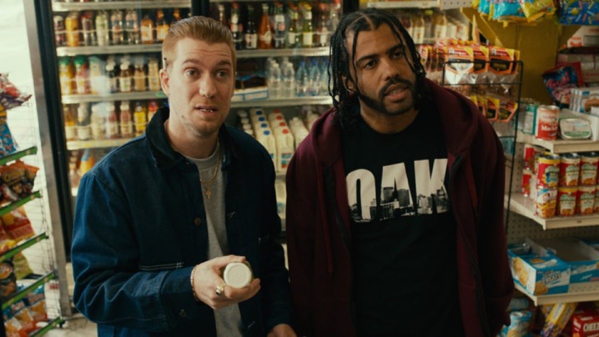 Rafael Calas and Daveed Diggs looking confused and taken aback in Blindspotting.