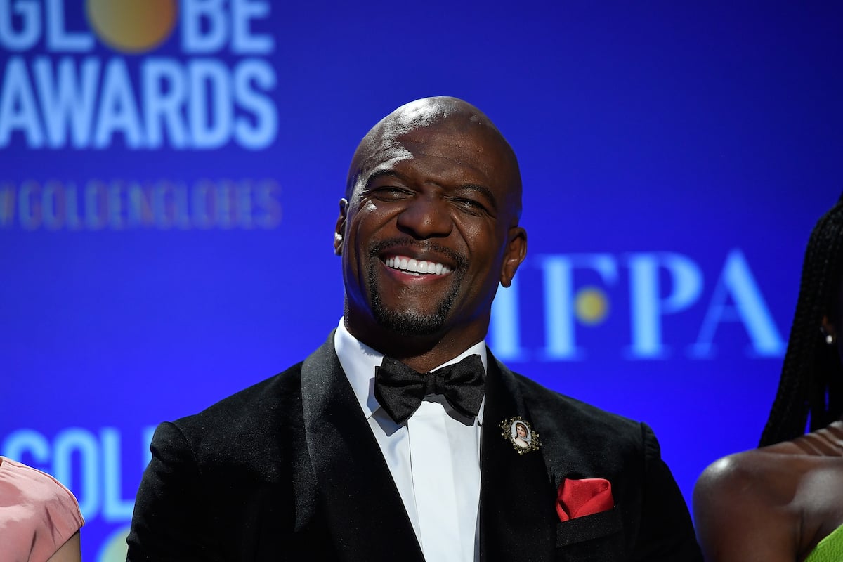 terry crews smiling at the golden globe award nomination announcements