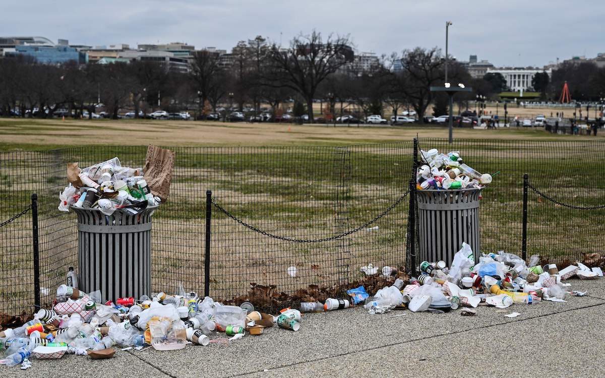 The White House is seen in the background, as trash lays uncollected on the National Mall due to the partial shutdown of the US government on January 2, 2019 in Washington, DC. - President Donald Trump warned Wednesday the US federal government may not fully reopen any time soon, as he stood firm on his demand for billions of dollars in funding for a border wall with Mexico. Addressing a cabinet meeting on the 12th day of the partial shutdown, Trump warned it "could be a long time" before the impasse is resolved. (Photo by Andrew Caballero-Reynolds / AFP) (Photo credit should read ANDREW CABALLERO-REYNOLDS/AFP/Getty Images)