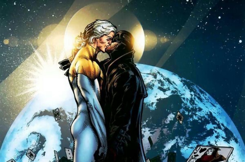Midnighter and Apollo kissing each other with the earth in the background