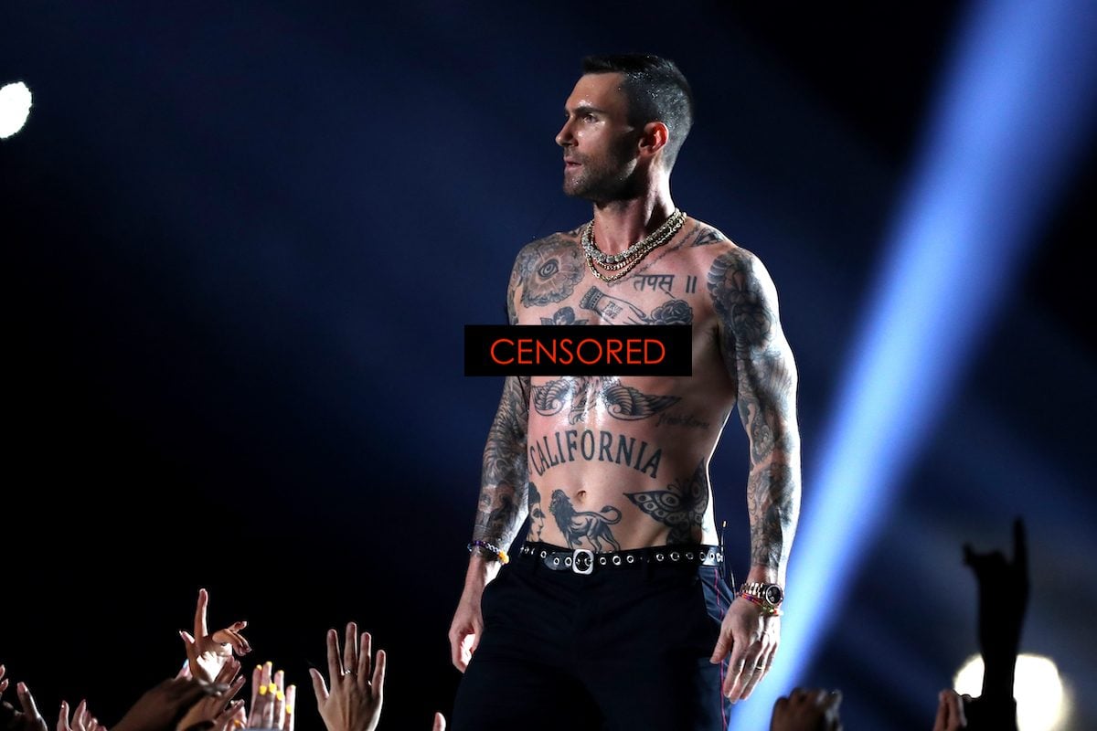 Adam Levine of Maroon 5 performs shirtless during the Pepsi Super Bowl LIII Halftime Show