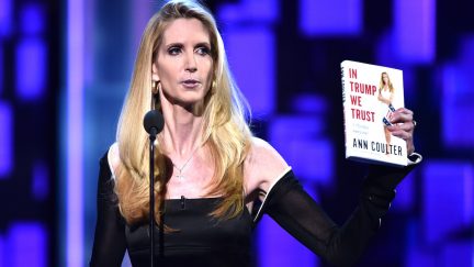 Ann Coulter speaks onstage at The Comedy Central Roast of Rob Lowe while holding her book 'In Trump We Trust'