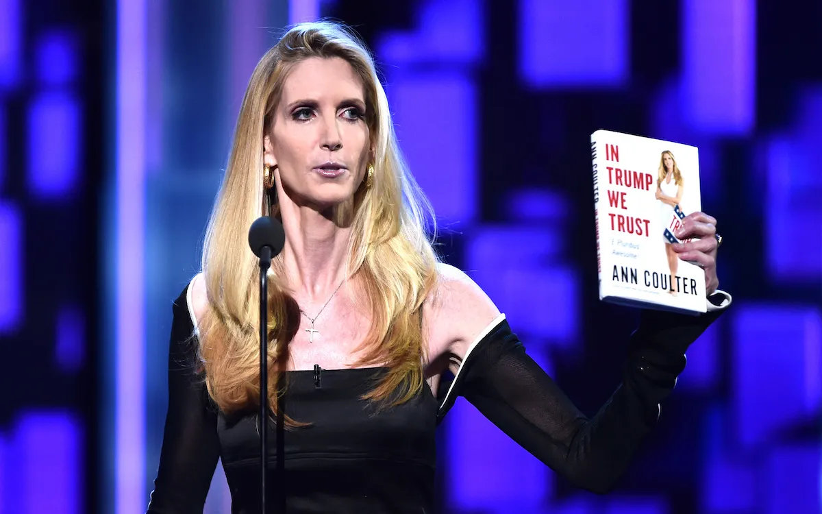 Ann Coulter speaks onstage at The Comedy Central Roast of Rob Lowe while holding her book 'In Trump We Trust'