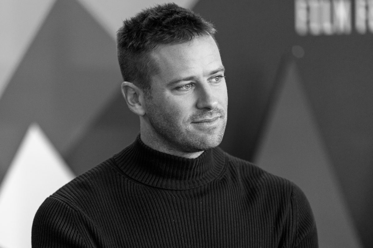 armie hammer in a turtleneck