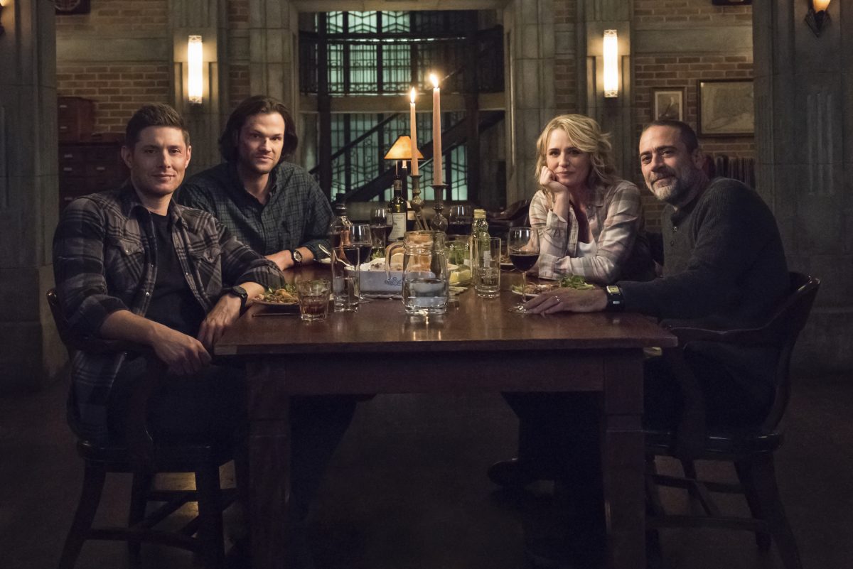 The whole Winchester family around a dinner table in Supernatural.