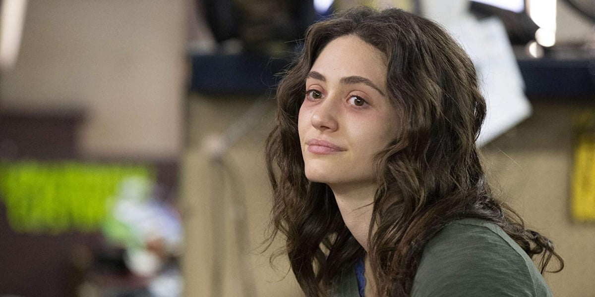 Emmy Rossum as Fiona Gallagher on Shameless with red eyes probably because she's exhausted from taking care of her shitty ass family of ingrates!