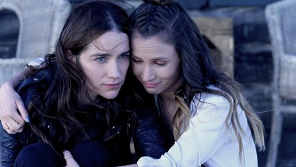 Melanie Scrofano and Dominique Provost-Chalkley in Wynonna Earp (2016)