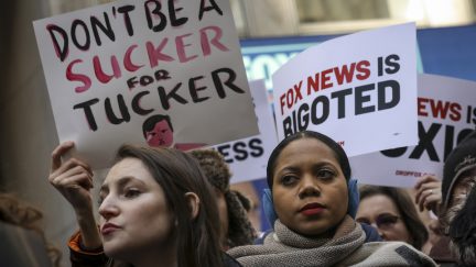 Protesters rally against Fox News outside the Fox News headquarters