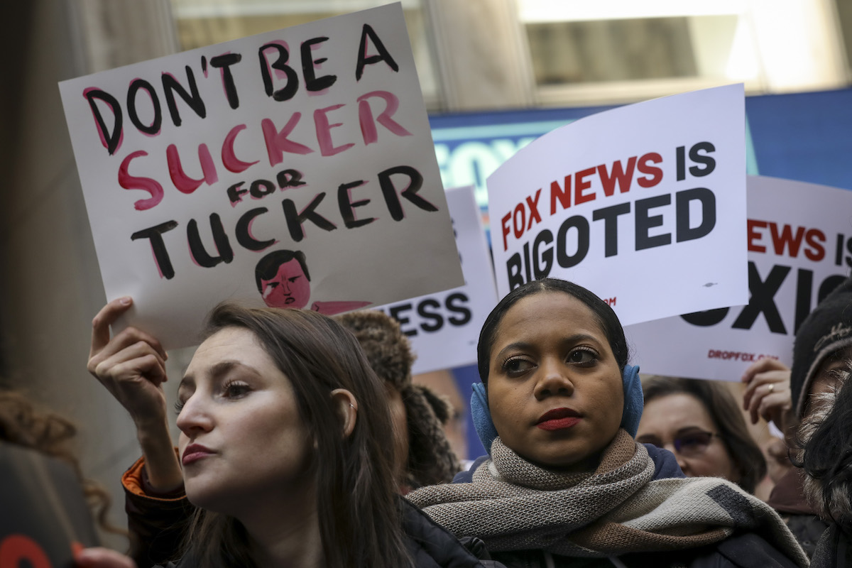 Protesters rally against Fox News outside the Fox News headquarters