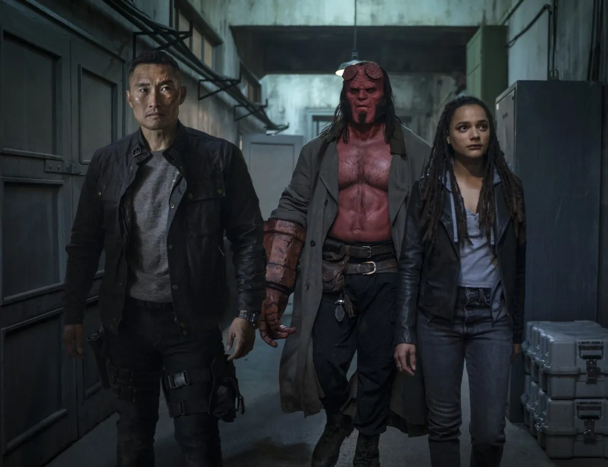 Ben Daimio (Daniel Dae Kim, left), Hellboy (David Harbour, center) and Alice Monaghan (Sasha Lane) in HELLBOY.