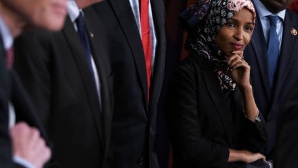 U.S. Rep. Ilhan Omar (D-MN) listens during a news conference.