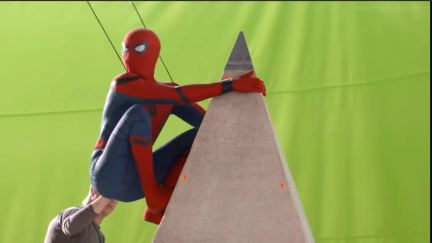 Spider-Man gets a boost during a green screen shot for Spider-Man: Homecoming in this The Marvel Universe Without the Special Effects video from GamesRadar.