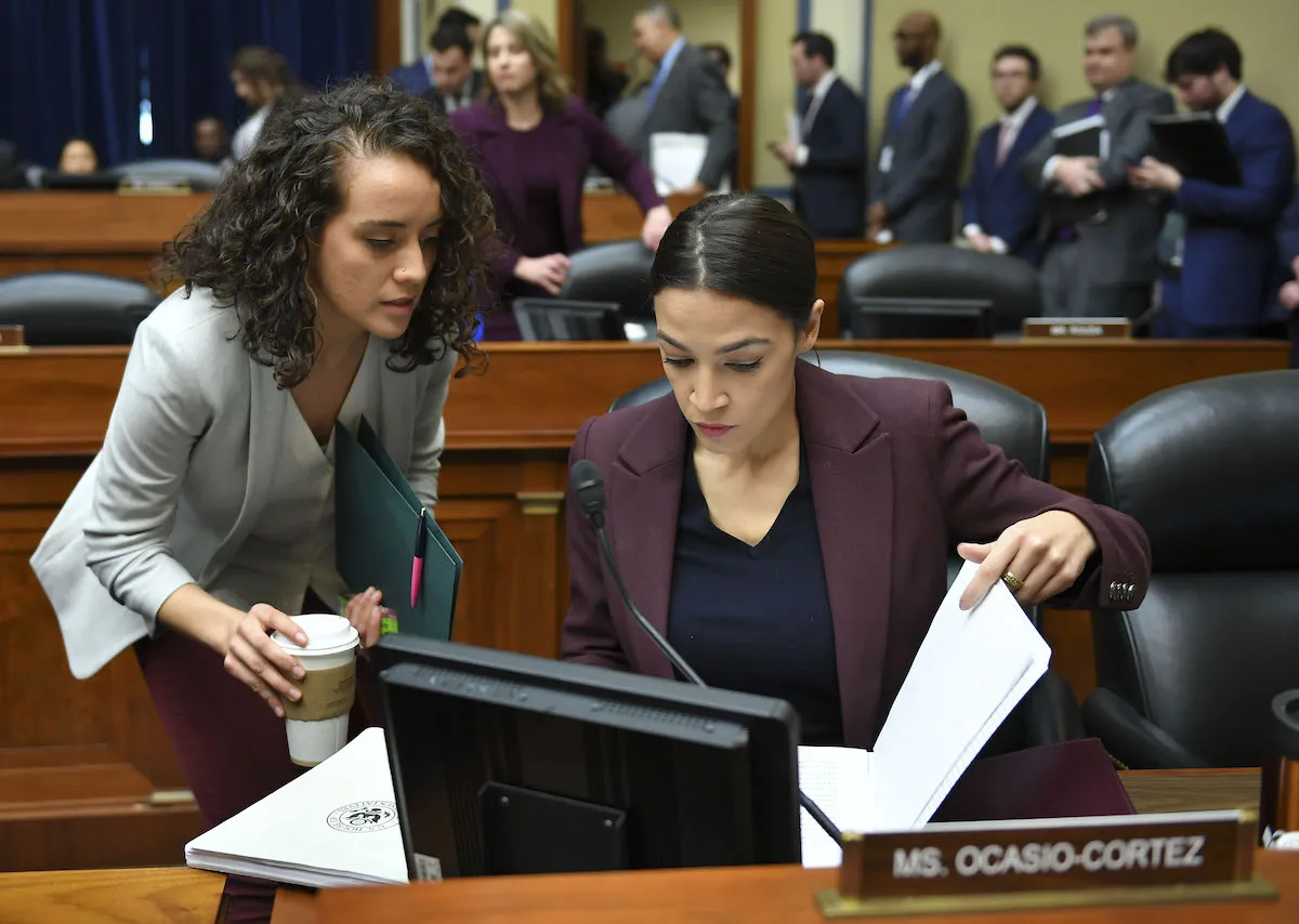US Congresswoman Alexandria Ocasio-Cortez and her staff prepare to question Michael Cohen.