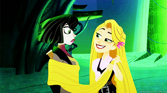 Rapunzel hugs BFF Cassandra with her hair in Rapunzel's Tangled Adventure.