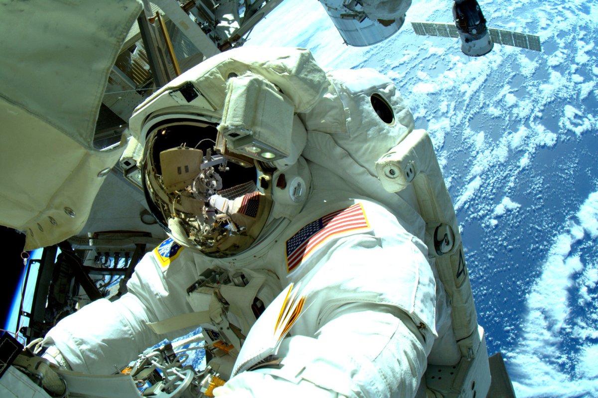 Astronauts complete a NASA spacewalk.