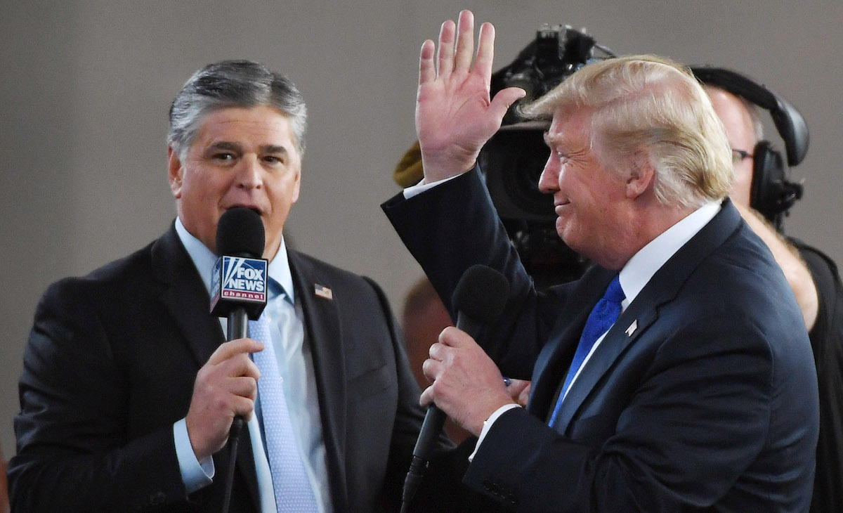 Donald Trump and Sean Hannity celebrate the propaganda machine that is Fox news.