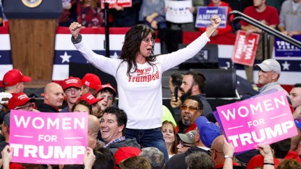 Women for Trump signs at a Republican rally.