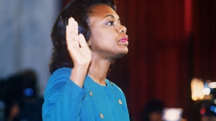 US law professor Anita Hill takes oath, 12 October 1991, before the Senate Judiciary Committee in Washington D.C.. Hill filed sexual harassment charges against US Supreme Court nominee Clarence Thomas. (Photo credit should read JENNIFER LAW/AFP/Getty Images)
