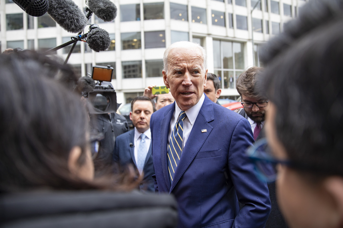 Joe Biden talking to reporters, telling them he's not sorry for anything.