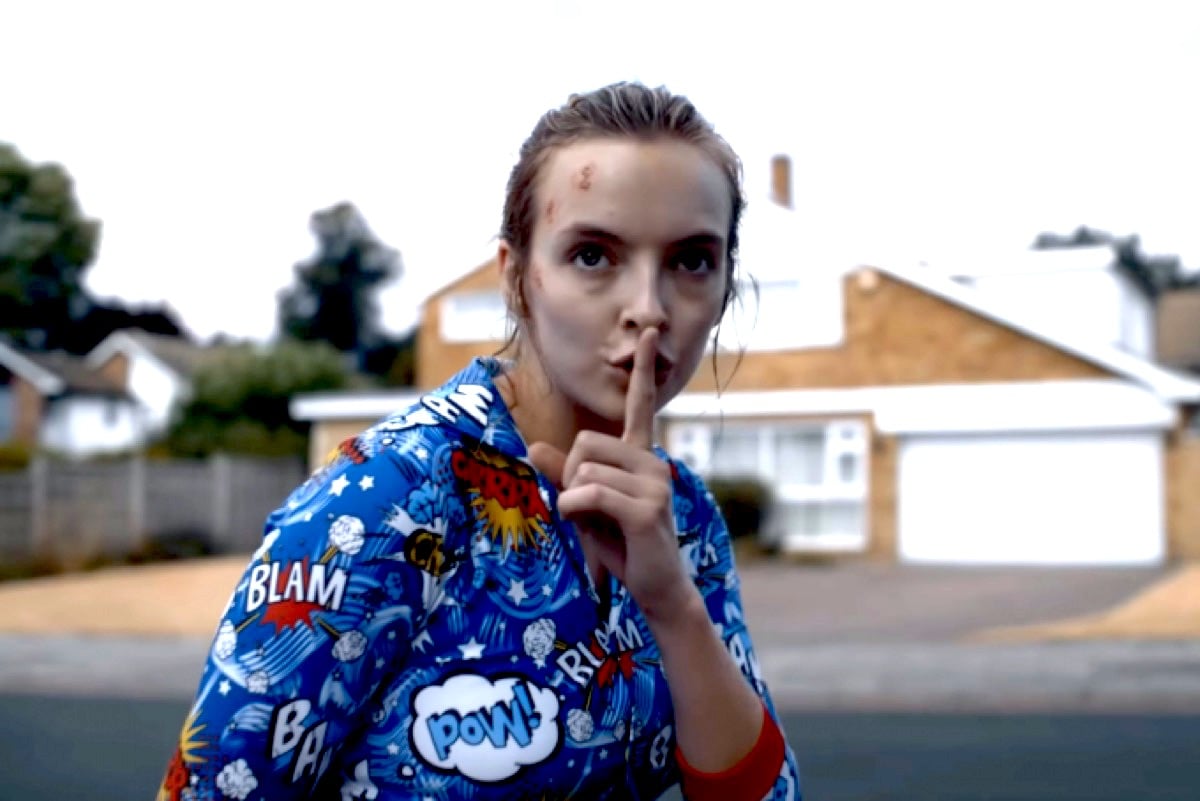 Villanelle wears pajamas and makes "shh" sign in Killing Eve.