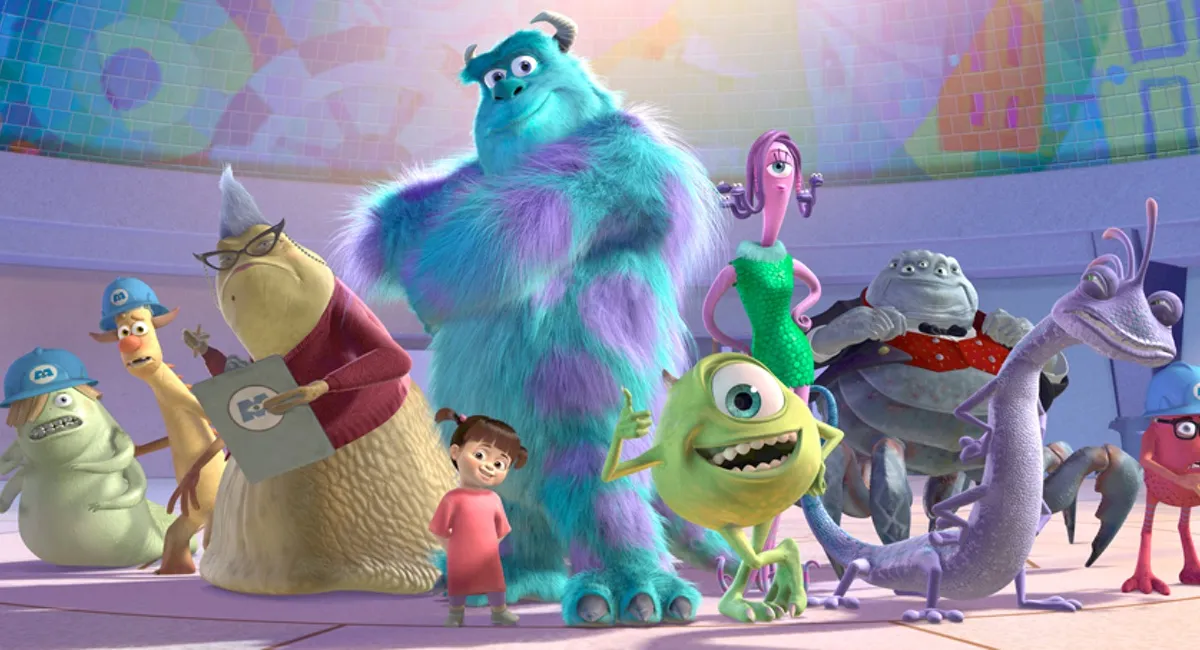 The animated cast of Pixar's classic Monsters Inc. standing together.