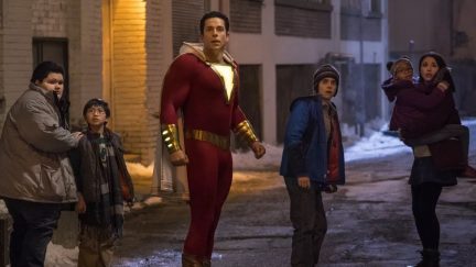 The family at the heart of DC's Shazam flees a villain in a still from the film.
