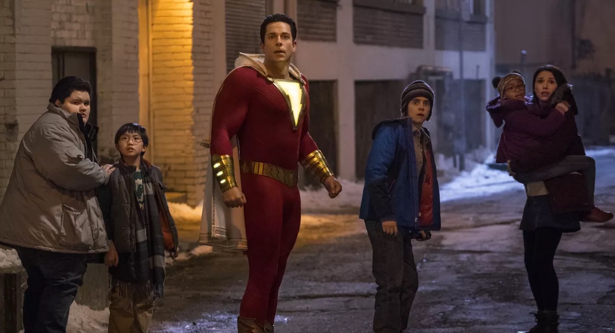 The family at the heart of DC's Shazam flees a villain in a still from the film.