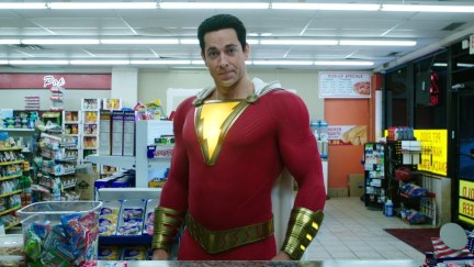 Shazam standing in front of the counter at a convenience store.