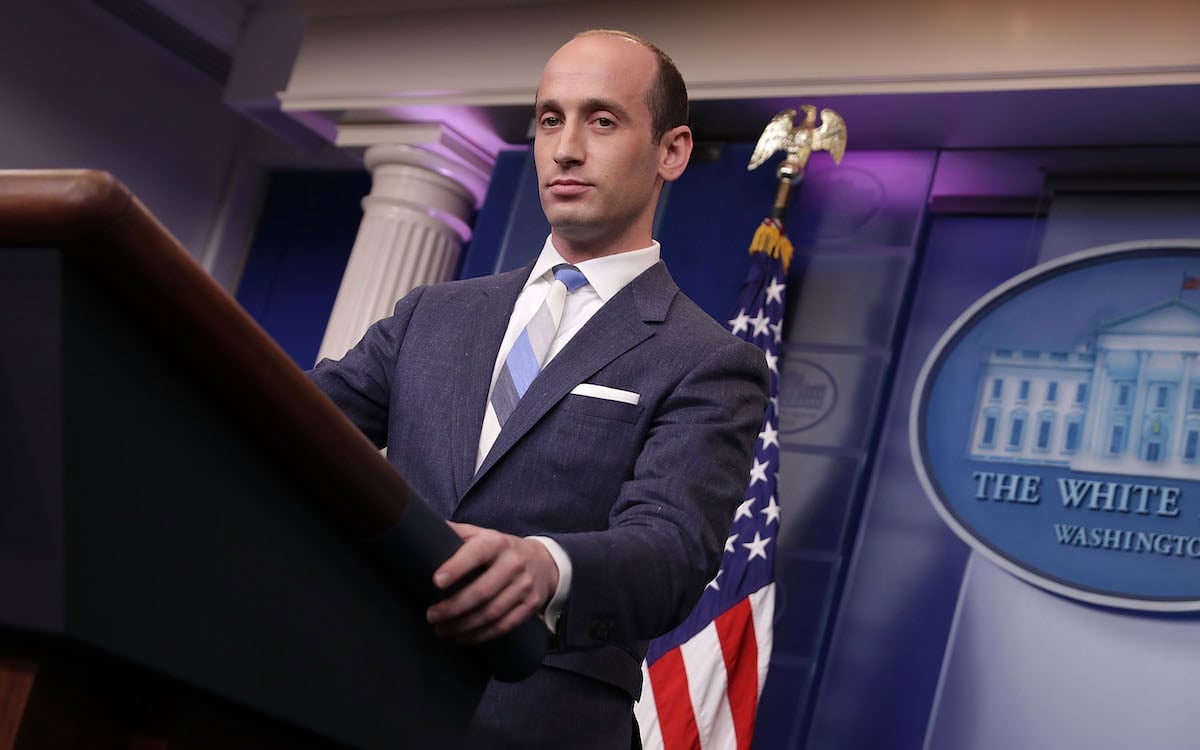 White Nationalist Steven Miller stands at the White House press briefing podium.