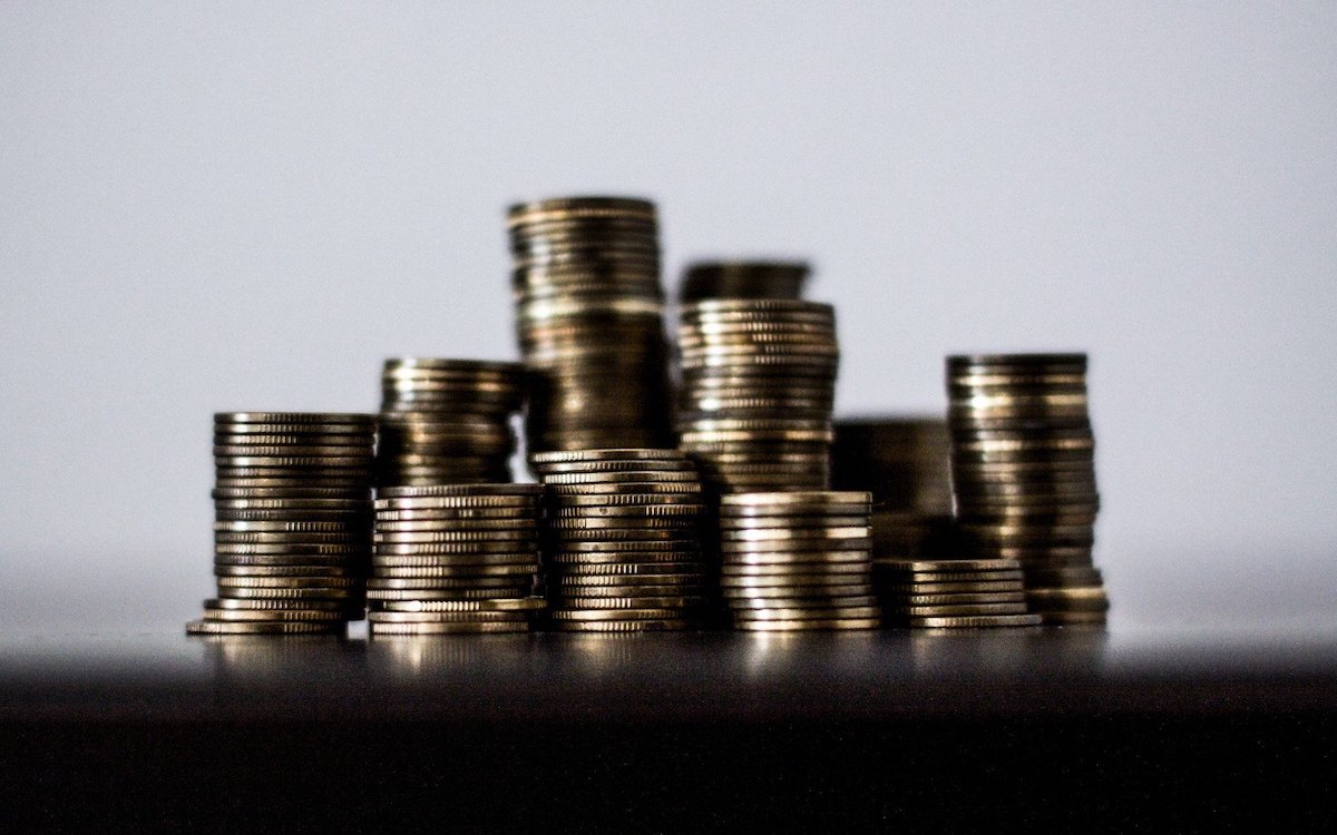 A pile of coins on a table.
