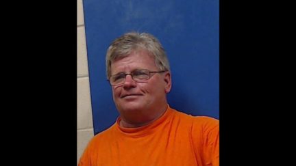 Rep. Doug McLeod poses for his mugshot.